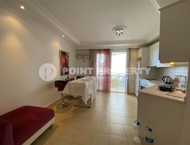 Небольшая уютная квартира, с мебелью и бытовой техникой, в центре тихого, благоустроенного района Аланьи - Тосмур-id-5730-фото-3