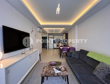 Благоустроенная современная квартира 1+1, общей площадью 65 м2, в спокойном, благоустроенном районе Аланьи - Авсаллар-id-5733-фото-1