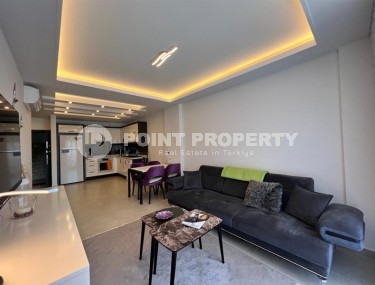 Благоустроенная современная квартира 1+1, общей площадью 65 м2, в спокойном, благоустроенном районе Аланьи - Авсаллар-id-5733-фото-2