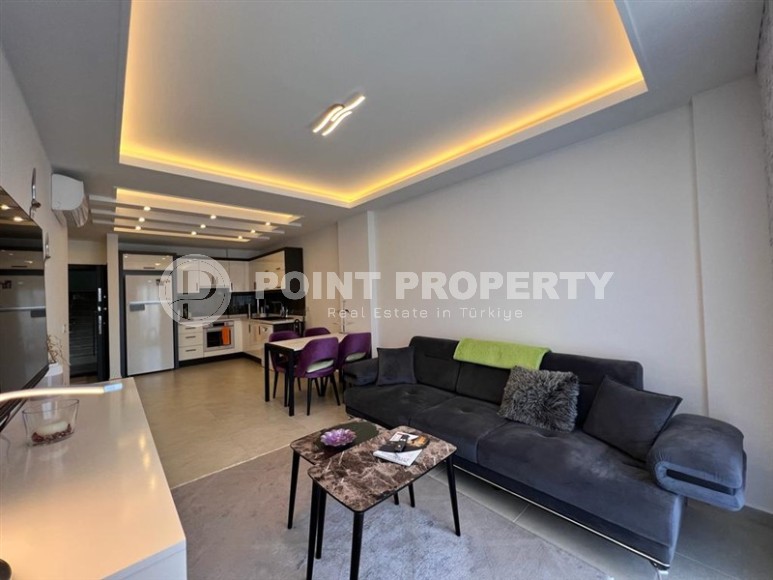 Благоустроенная современная квартира 1+1, общей площадью 65 м2, в спокойном, благоустроенном районе Аланьи - Авсаллар-id-5733-фото-2