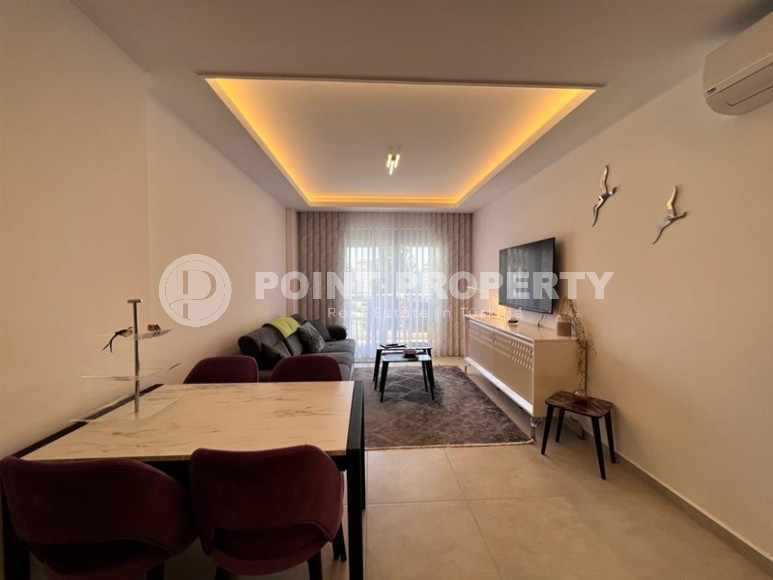 Благоустроенная современная квартира 1+1, общей площадью 65 м2, в спокойном, благоустроенном районе Аланьи - Авсаллар-id-5733-фото-3