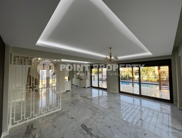 Современная трехэтажная вилла с бассейном и садом, в популярном курортном районе Анталии - Белек-id-5740-фото-2