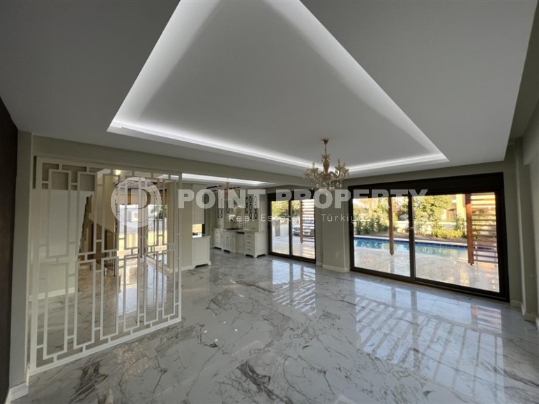 Современная трехэтажная вилла с бассейном и садом, в популярном курортном районе Анталии - Белек-id-5740-фото-2