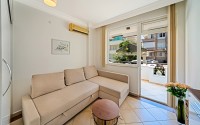 Cozy, bright apartment on the 1st floor in a building built in 2007, in the very center of Alanya-id-5743-photo-1