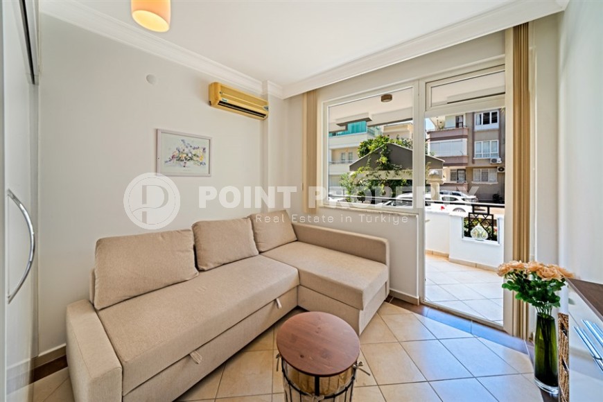 Cozy, bright apartment on the 1st floor in a building built in 2007, in the very center of Alanya-id-5743-photo-1