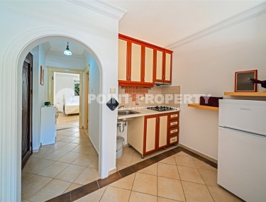 Cozy, bright apartment on the 1st floor in a building built in 2007, in the very center of Alanya-id-5743-photo-2