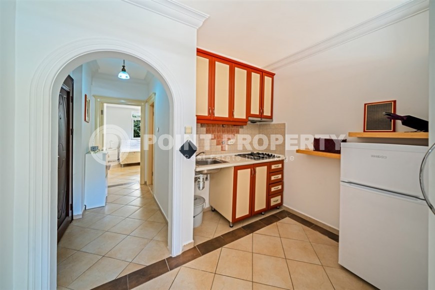 Cozy, bright apartment on the 1st floor in a building built in 2007, in the very center of Alanya-id-5743-photo-2