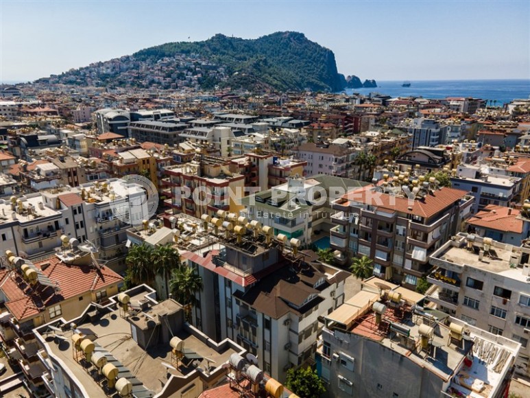 Cozy, bright apartment on the 1st floor in a building built in 2007, in the very center of Alanya-id-5743-photo-7