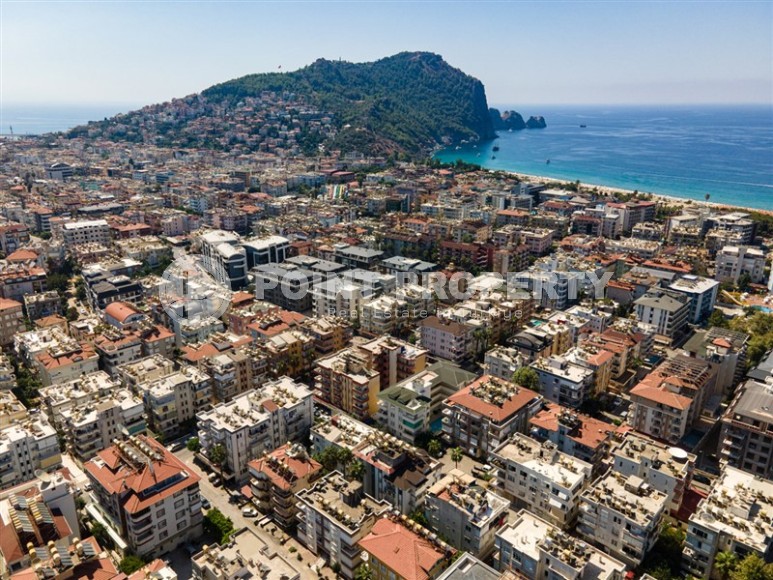 Cozy, bright apartment on the 1st floor in a building built in 2007, in the very center of Alanya-id-5743-photo-9