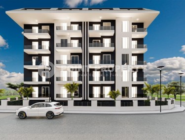 Apartments on the 1st and 2nd floors in a residential complex under construction, in the center of Mahmutlar-id-5755-photo-1