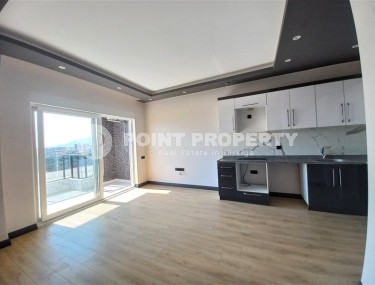 Апартаменты с качественной чистовой отделкой в двух километрах от моря, в престижном районе Аланьи - Верхняя Оба-id-5756-фото-3