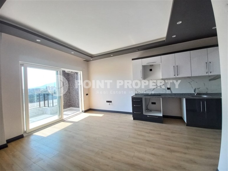 Апартаменты с качественной чистовой отделкой в двух километрах от моря, в престижном районе Аланьи - Верхняя Оба-id-5756-фото-3