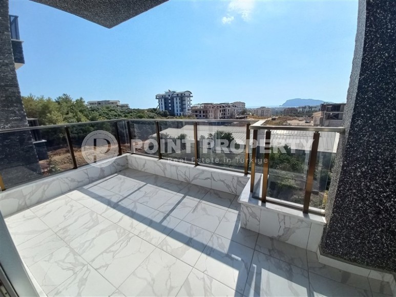 Апартаменты с качественной чистовой отделкой в двух километрах от моря, в престижном районе Аланьи - Верхняя Оба-id-5756-фото-6