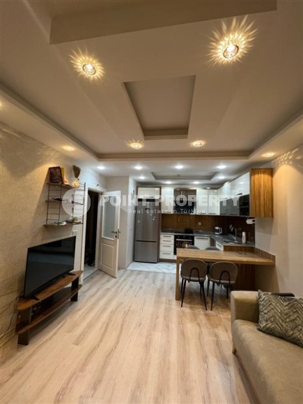 Комфортабельная меблированная квартира 1+1, общей площадью 60 м2, в 400 метрах от пляжа и набережной-id-5759-фото-2