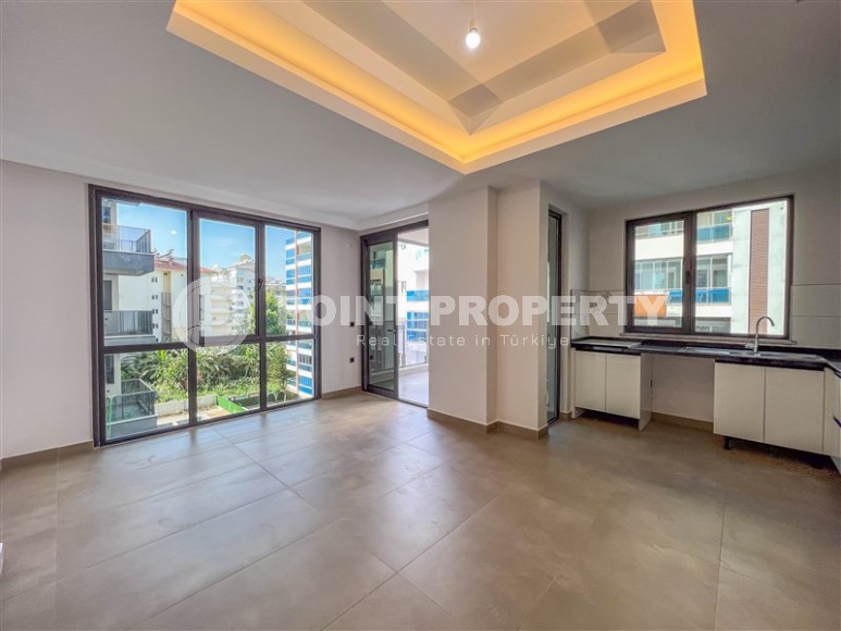 Новая квартира с чистовой отделкой в 150 метрах от моря, в центре современного района Аланьи - Махмутлар-id-5767-фото-2