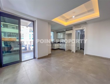 New apartment with fine finishing 150 meters from the sea, in the center of the modern area of Alanya - Mahmutlar-id-5767-photo-3