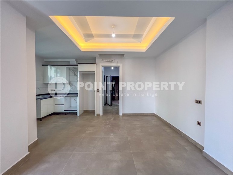 Новая квартира с чистовой отделкой в 150 метрах от моря, в центре современного района Аланьи - Махмутлар-id-5767-фото-4