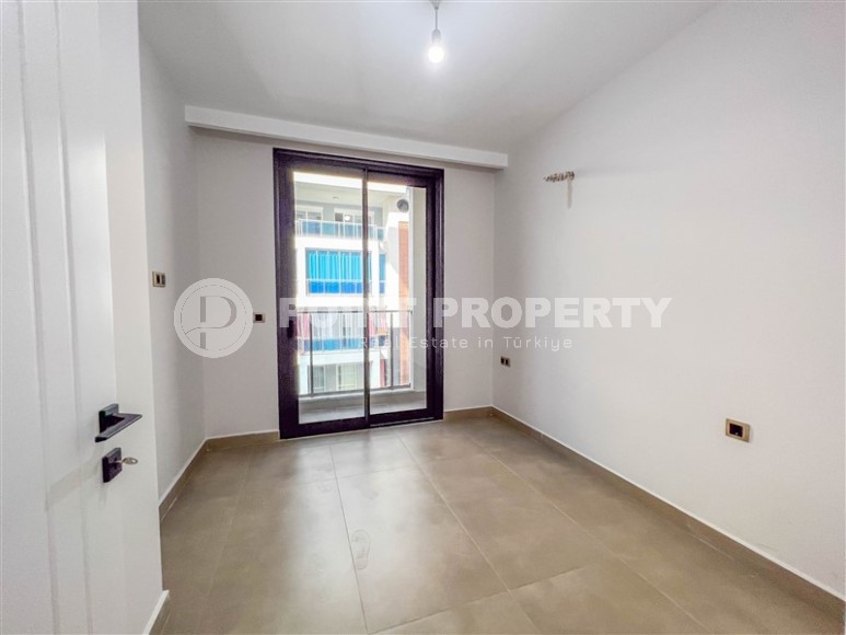 Новая квартира с чистовой отделкой в 150 метрах от моря, в центре современного района Аланьи - Махмутлар-id-5767-фото-6