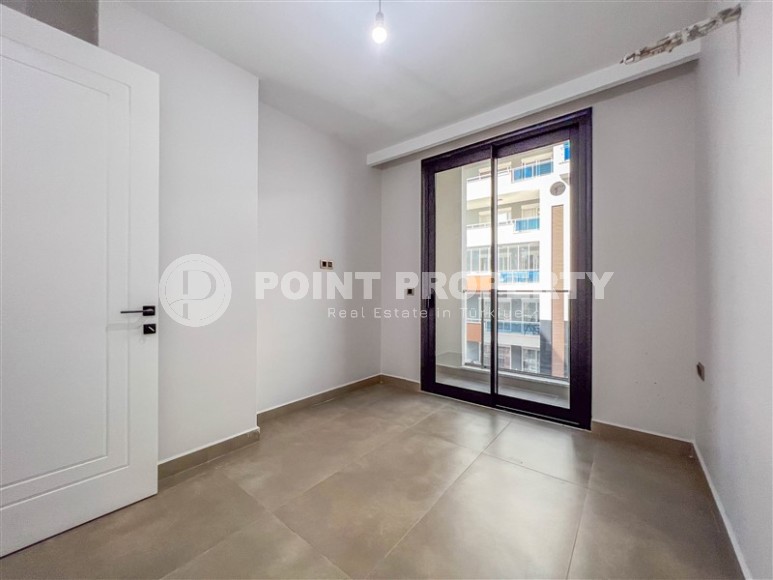 Новая квартира с чистовой отделкой в 150 метрах от моря, в центре современного района Аланьи - Махмутлар-id-5767-фото-7