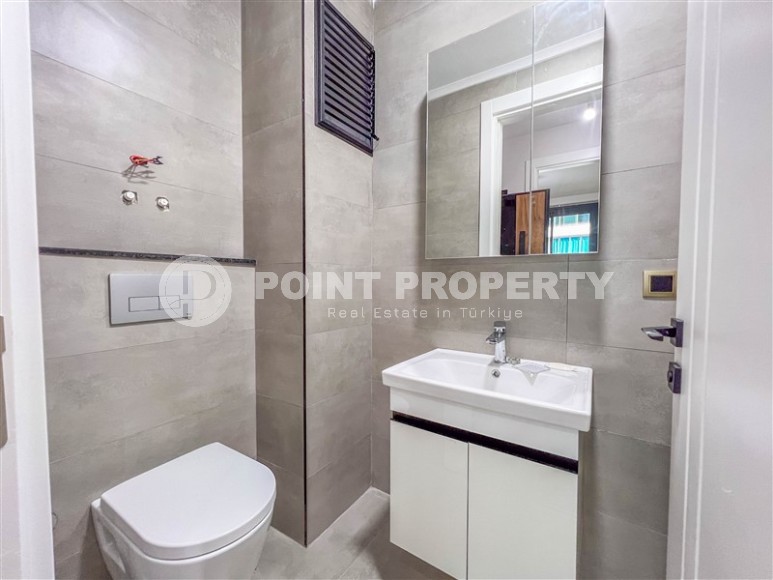 Новая квартира с чистовой отделкой в 150 метрах от моря, в центре современного района Аланьи - Махмутлар-id-5767-фото-9