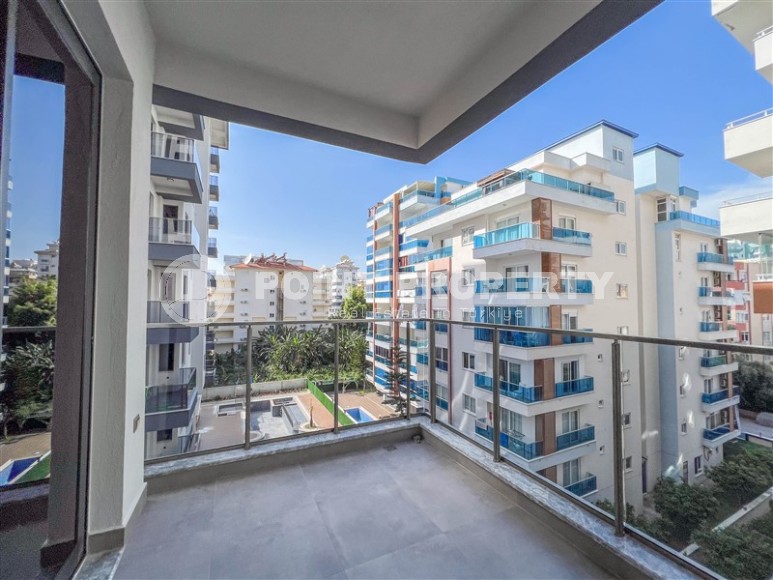 Новая квартира с чистовой отделкой в 150 метрах от моря, в центре современного района Аланьи - Махмутлар-id-5767-фото-11