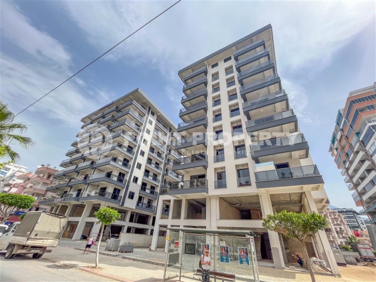 Новая квартира с чистовой отделкой в 150 метрах от моря, в центре современного района Аланьи - Махмутлар-id-5767-фото-17