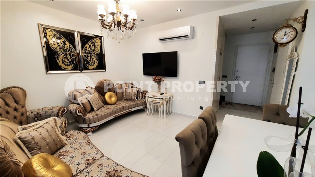 Стильная двухуровневая квартира на 5-м этаже с мансардой, в 300 метрах от пляжа Клеопатры-id-5787-фото-2