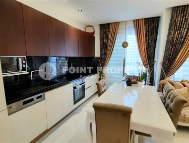 Стильная двухуровневая квартира на 5-м этаже с мансардой, в 300 метрах от пляжа Клеопатры-id-5787-фото-3