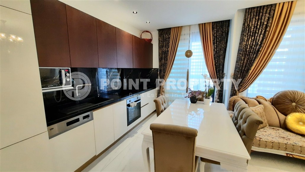 Стильная двухуровневая квартира на 5-м этаже с мансардой, в 300 метрах от пляжа Клеопатры-id-5787-фото-3