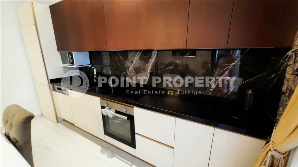 Стильная двухуровневая квартира на 5-м этаже с мансардой, в 300 метрах от пляжа Клеопатры-id-5787-фото-4