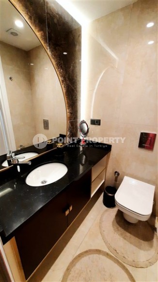 Стильная двухуровневая квартира на 5-м этаже с мансардой, в 300 метрах от пляжа Клеопатры-id-5787-фото-9