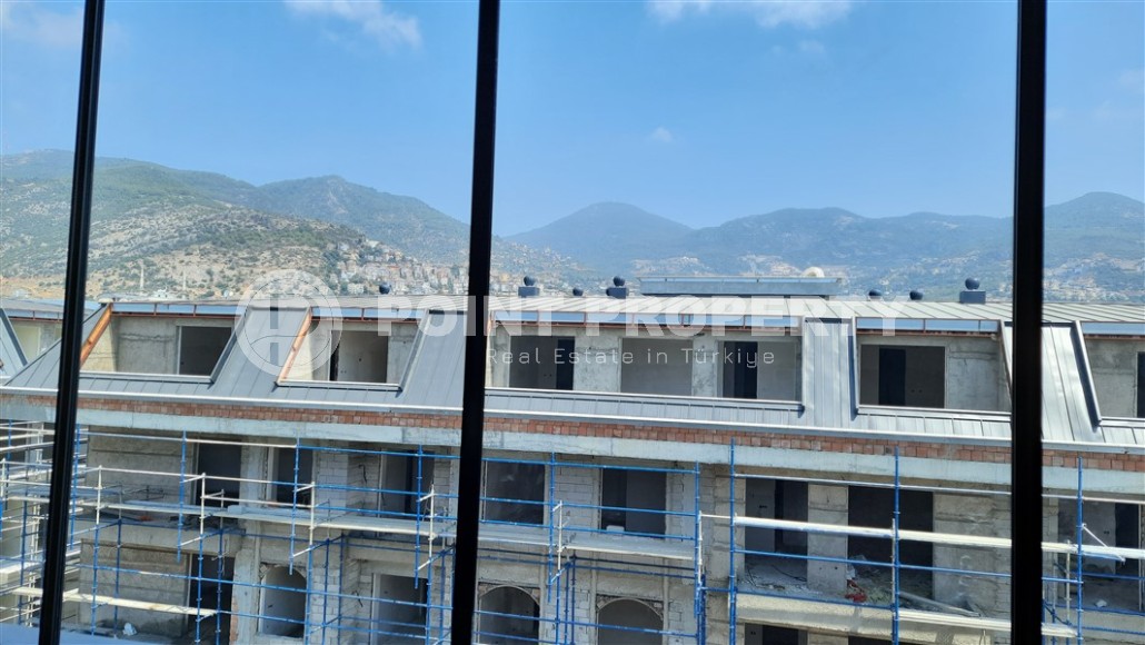 Стильная двухуровневая квартира на 5-м этаже с мансардой, в 300 метрах от пляжа Клеопатры-id-5787-фото-14