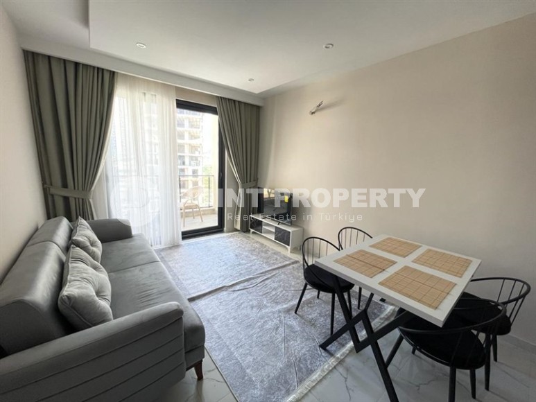 Small new apartment on the 4th floor, in a popular area of Alanya - Mahmutlar-id-5801-photo-2