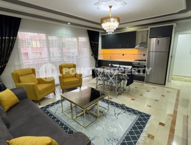 Stylish modern apartment 1+1, with a total area of 70 m2, on the first line from the sea, in the Mahmutlar area-id-5802-photo-2