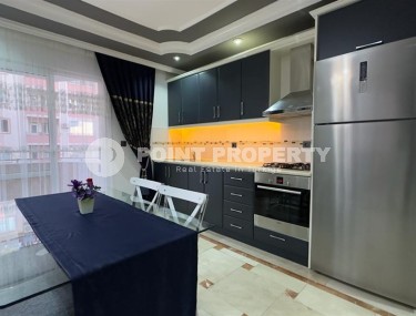 Stylish modern apartment 1+1, with a total area of 70 m2, on the first line from the sea, in the Mahmutlar area-id-5802-photo-3