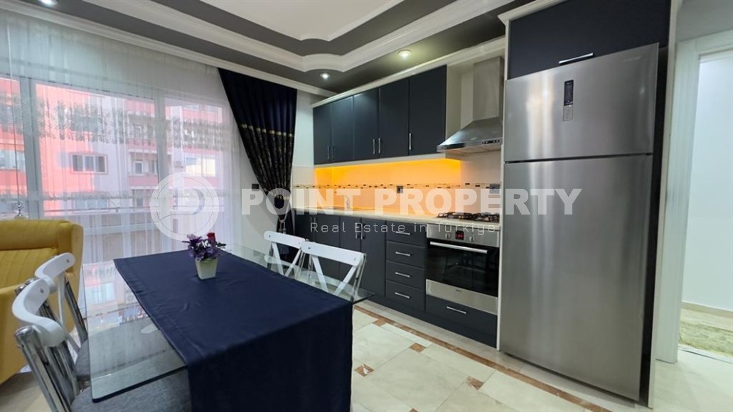 Stylish modern apartment 1+1, with a total area of 70 m2, on the first line from the sea, in the Mahmutlar area-id-5802-photo-3