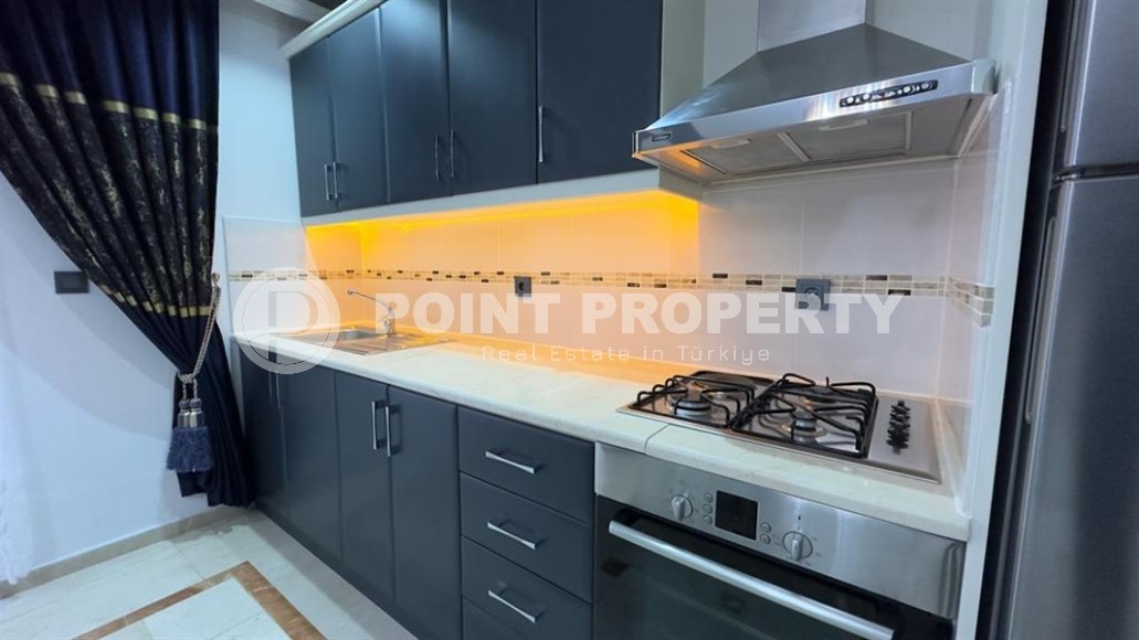 Stylish modern apartment 1+1, with a total area of 70 m2, on the first line from the sea, in the Mahmutlar area-id-5802-photo-5