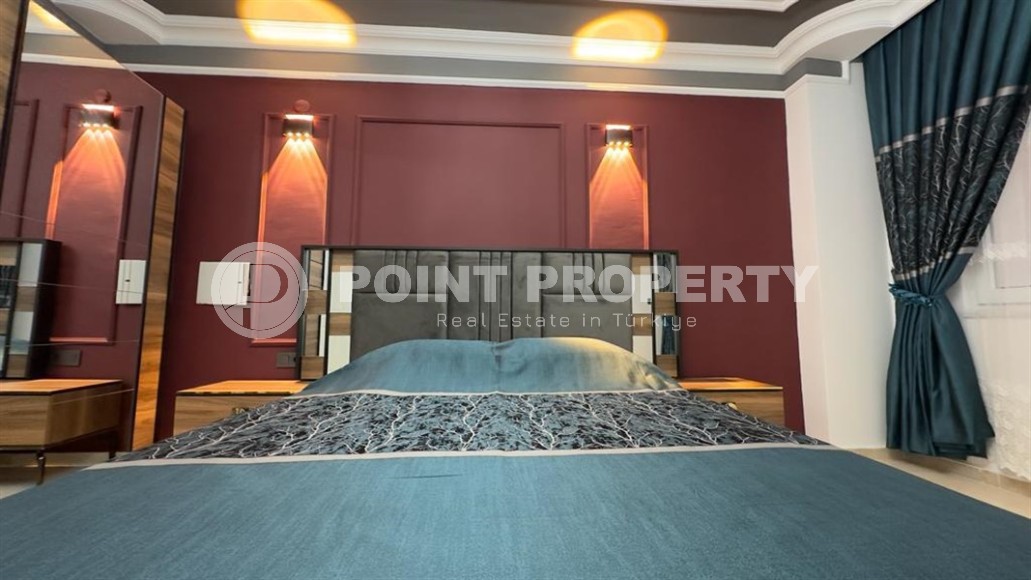 Stylish modern apartment 1+1, with a total area of 70 m2, on the first line from the sea, in the Mahmutlar area-id-5802-photo-8