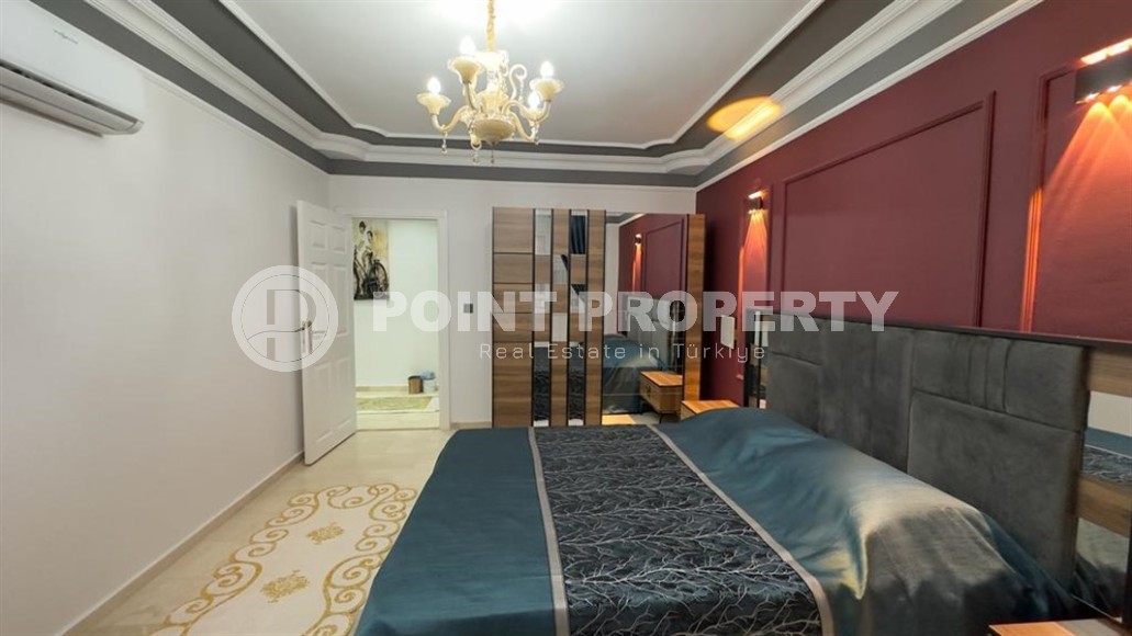 Stylish modern apartment 1+1, with a total area of 70 m2, on the first line from the sea, in the Mahmutlar area-id-5802-photo-9