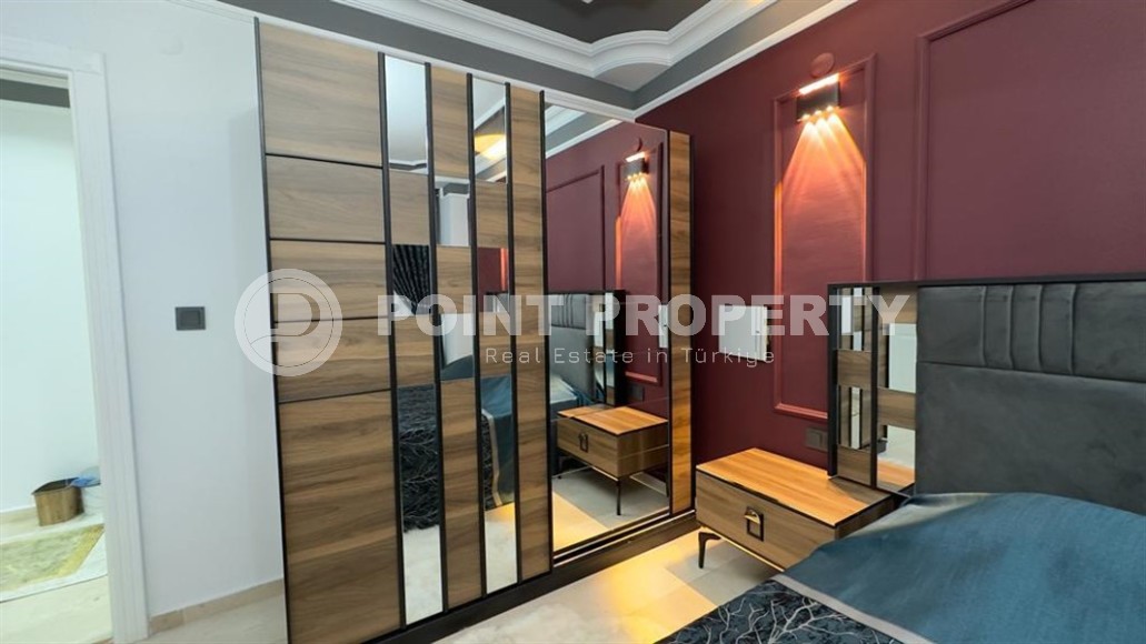 Stylish modern apartment 1+1, with a total area of 70 m2, on the first line from the sea, in the Mahmutlar area-id-5802-photo-10