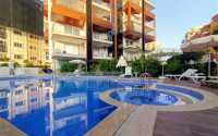 Large one bedroom apartment, 70m², with sea and mountain views in Mahmutlar, Alanya-id-1454-photo-1