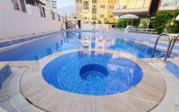 Large one bedroom apartment, 70m², with sea and mountain views in Mahmutlar, Alanya-id-1454-photo-2