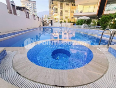 Large one bedroom apartment, 70m², with sea and mountain views in Mahmutlar, Alanya-id-1454-photo-2