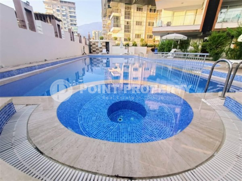 Large one bedroom apartment, 70m², with sea and mountain views in Mahmutlar, Alanya-id-1454-photo-2