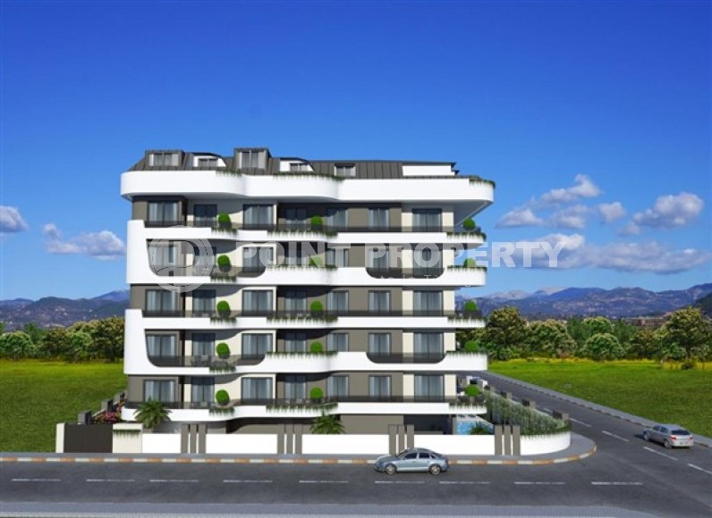 Apartments in a residential complex at the final stage of construction, in the center of a modern, developed area of Alanya - Mahmutlar-id-5809-photo-11