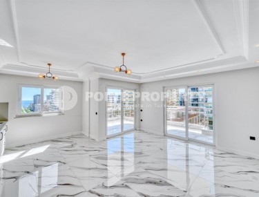 Apartments with high-quality finishing, 350 meters from the sea, in the center of the popular area of Alanya - Mahmutlar-id-5810-photo-3