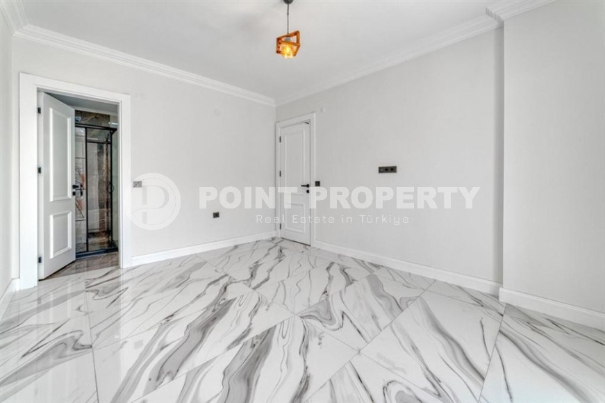 Apartments with high-quality finishing, 350 meters from the sea, in the center of the popular area of Alanya - Mahmutlar-id-5810-photo-8