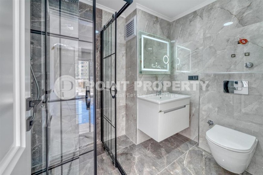 Apartments with high-quality finishing, 350 meters from the sea, in the center of the popular area of Alanya - Mahmutlar-id-5810-photo-12