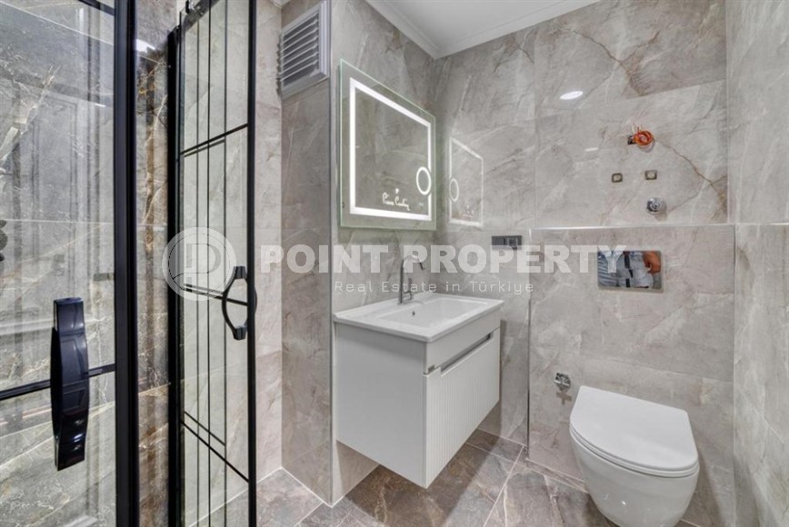 Apartments with high-quality finishing, 350 meters from the sea, in the center of the popular area of Alanya - Mahmutlar-id-5810-photo-13