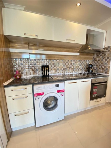 Large one bedroom apartment, 70m², with sea and mountain views in Mahmutlar, Alanya-id-1454-photo-16